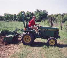 Sara on the John Deere